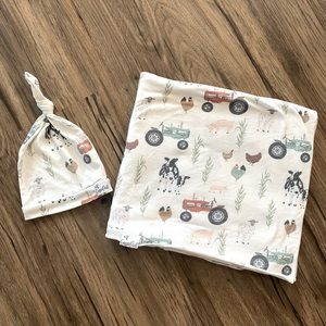 Copper Pearl “Jo” swaddle blanket and matching knotted hat.